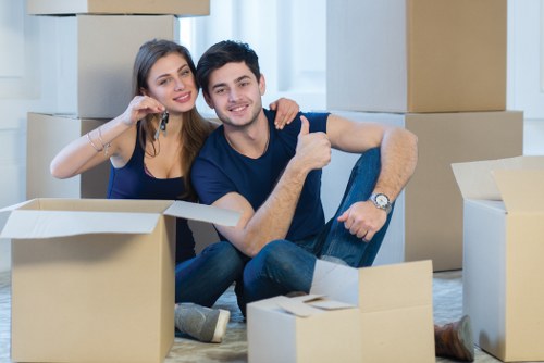 Professional house removals planning in Pentonville with moving boxes and packing supplies