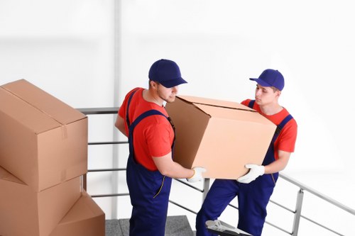 Professional removal services in Pentonville with moving van and packed boxes