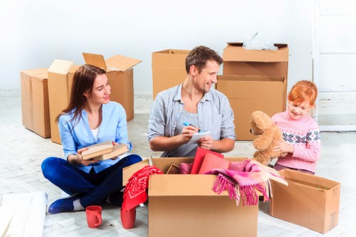 Local movers handling furniture and packing for a Pentonville relocation