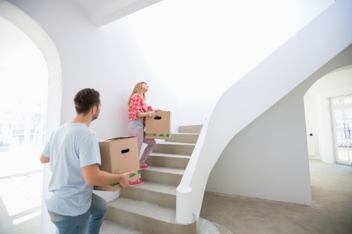 Packed boxes and wrapped furniture ready for local relocation