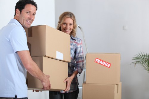 Professional movers loading boxes for a Pentonville relocation